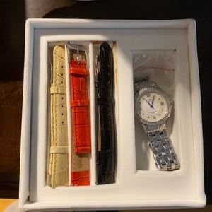 Invicta watch with 3 additional bands. Like new
